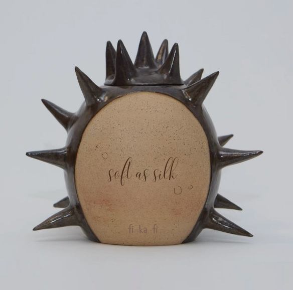 Back view of Fikafi’s ‘Not Before Coffee’